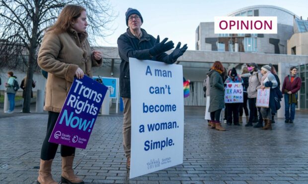 pro and anti-gender reform campaigners outside the Scottish Parliament.