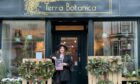 Hannah Ballantyne standing outside Terra Botanica Perth with the 2022 gift guide.