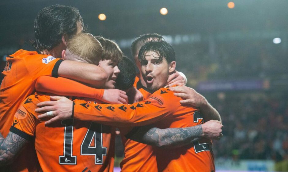 Jubilant Dundee United stars celebrate against Ross County.