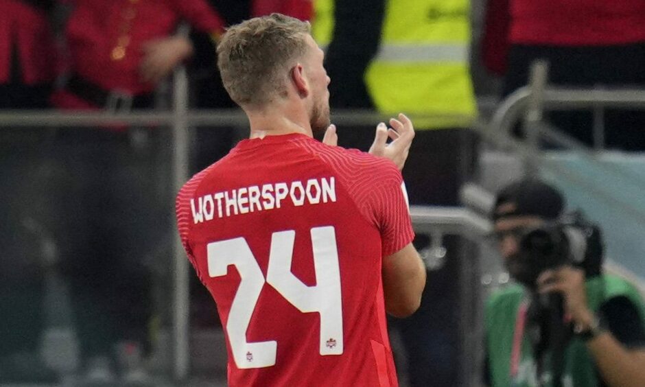 David Wotherspoon applauds the Canada fans after their World Cup exit. Image: Shutterstock.