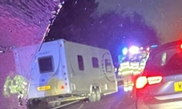 Emergency services in attendance at a crash on the A92 involving a car and caravan. Image: Fife Jammer Locations/Facebook.