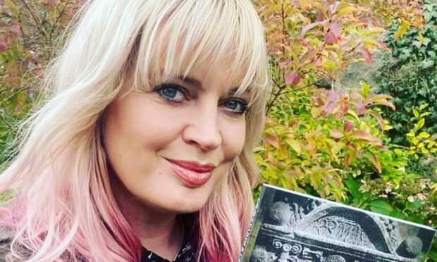 Charlotte Golledge with her new book. Image: Charlotte Golledge