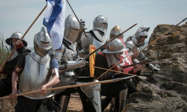 Author Leonard Low rehearses a battle re-enactment of the Battle of St Monans near Elie in 2017. Image: Tina Norris