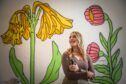 Dundee street artist Diane Selbie has had her fair share of rain before the flowers. Image: Mhairi Edwards/DC Thomson.