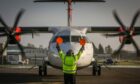 A Loganair flight taxis on the runway at Dundee Airport. Image: Mhairi Edwards/DCT Media