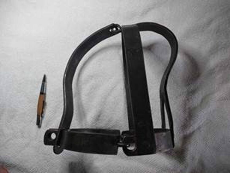 Scold's bridle used on suspected 'witch'.