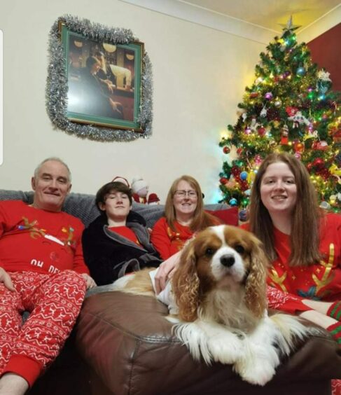 Shirley, Paul, son Joshua, daughter Holly and dog Odie. 