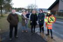 Inveresk Community Council chairman Gus Leighton with Edzell PS parent council officials Laura Robertson and daughter Ferne,3, Claire Thomson, Ashleigh Leslie and lollipop lady Lisa Ross. Image: Paul Reid