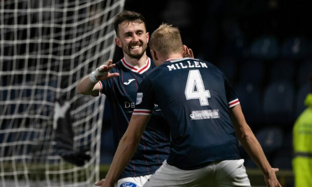 Aidan Connolly celebrates with Ross Millen. Image: SNS.