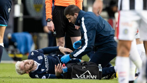 Tyler French receives treatment at St Mirren. Image: SNS.