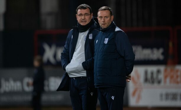 Dundee boss Gary Bowyer and assistant Billy Barr watch their side take on Dunfermline. Image: SNS.