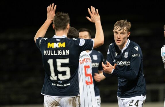 Max Anderson is congratulated by team-mate Josh Mulligan in victory over Dunfermline. Image: SNS.