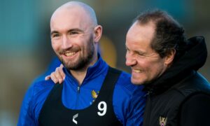 St Johnstone players applaud Chris Kane back onto the training ground as striker takes another big step on comeback trail
