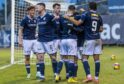 Dundee celebrate during victory over Queen's Park. Image: SNS.