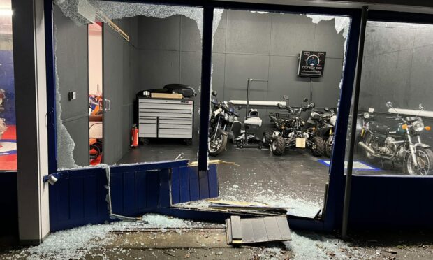The aftermath of the attempted ram-raid at Willison Motors. Image: Jim Taylor.