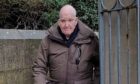 Forfar paedophile Alistair Lee leaves Dundee Sheriff Court.