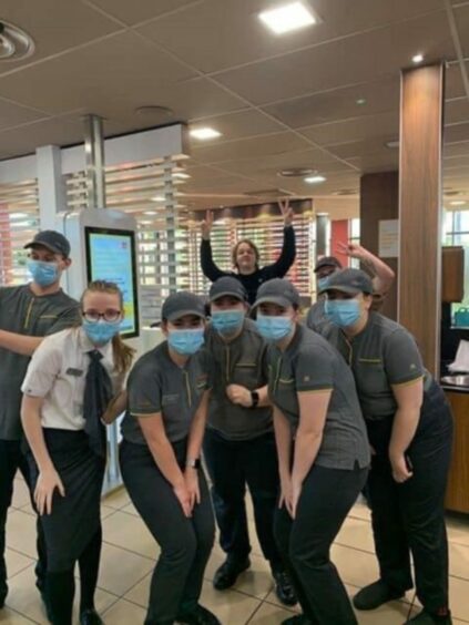 Staff at the Forfar McDonald’s on the A90 pose with Lewis Capaldi 