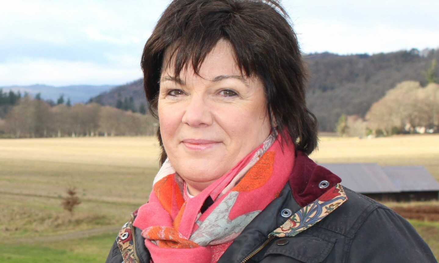 Claire McLaren with a view of the River Tay behind.