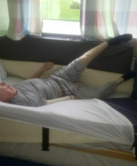 Eddie in his hospital bed at Cameron Hospital, Fife