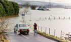 Flooding at Bardmony Bridge, near Alyth, during the Great Tay Flood of 1993. Image: DC Thomson.