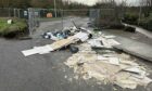 Builders' waste left dumped in Glenrothes. Image: Neil Henderson/DC Thomson