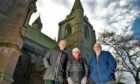 Pamela Thomson and Douglas Taylor of the Society of Friends of Brechin Cathedral with consultant Nick Cooke, left, at the Angus landmark. Image: Gareth Jennings/DC Thomson.