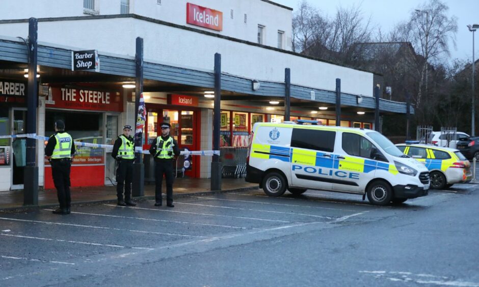 Police at the Campfield Square shops in Barnhill following the break-ins