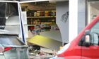 Damage to the Premier shop on Claypotts Road after the alleged ram-raid. Image: Gareth Jennings/DC Thomson