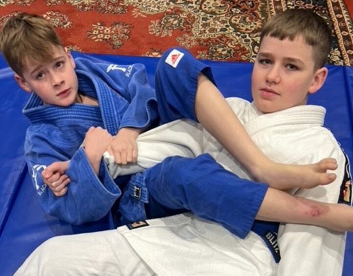 Dalgety Bay judo twins Lewis and Elliot practice at home