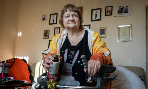 Carol Fotheringham says she is "trapped" in her Dundee council home.