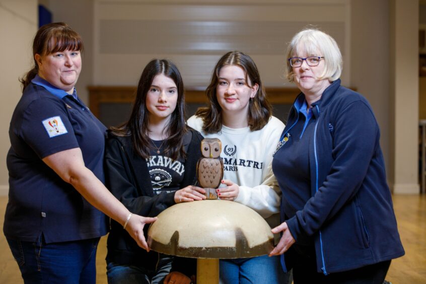 The girls with Brownie leaders Mandy Speirs, left, and Janet Douglas.
