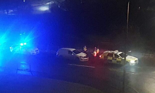 Police in attendance at the crash on Arran Drive in Dundee. Image: James Simpson/DC Thomson.