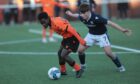 Stand-out Mathew Cudjoe holds off pressure. Pic: Arwen Moses / Dundee United