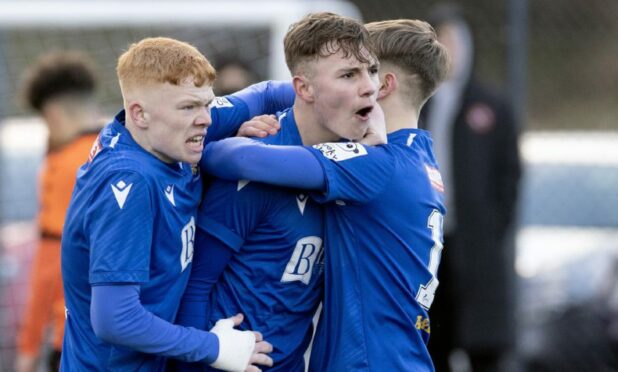 Jackson Mylchreest (centre) celebrates a goal against Dundee United. Image: PPA