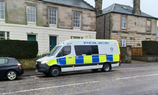 A police van near the scene on Stormont Street. Image: Kieran Webster/DC Thomson