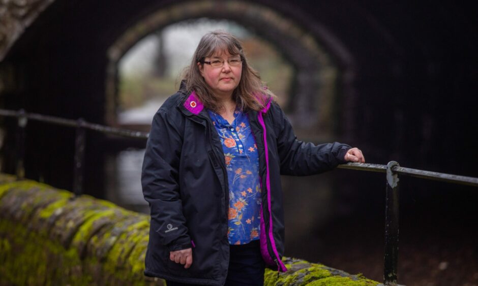 Janice Haig at the Craigie Burn - a source of flooding in Perth.