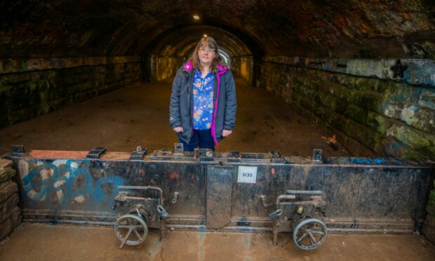 Janice Haig at the floodgate near her home in Perth. Image: Steve MacDougall/DC Thomson.