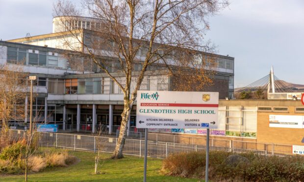 Glenrothes High School with school sign in foreground.