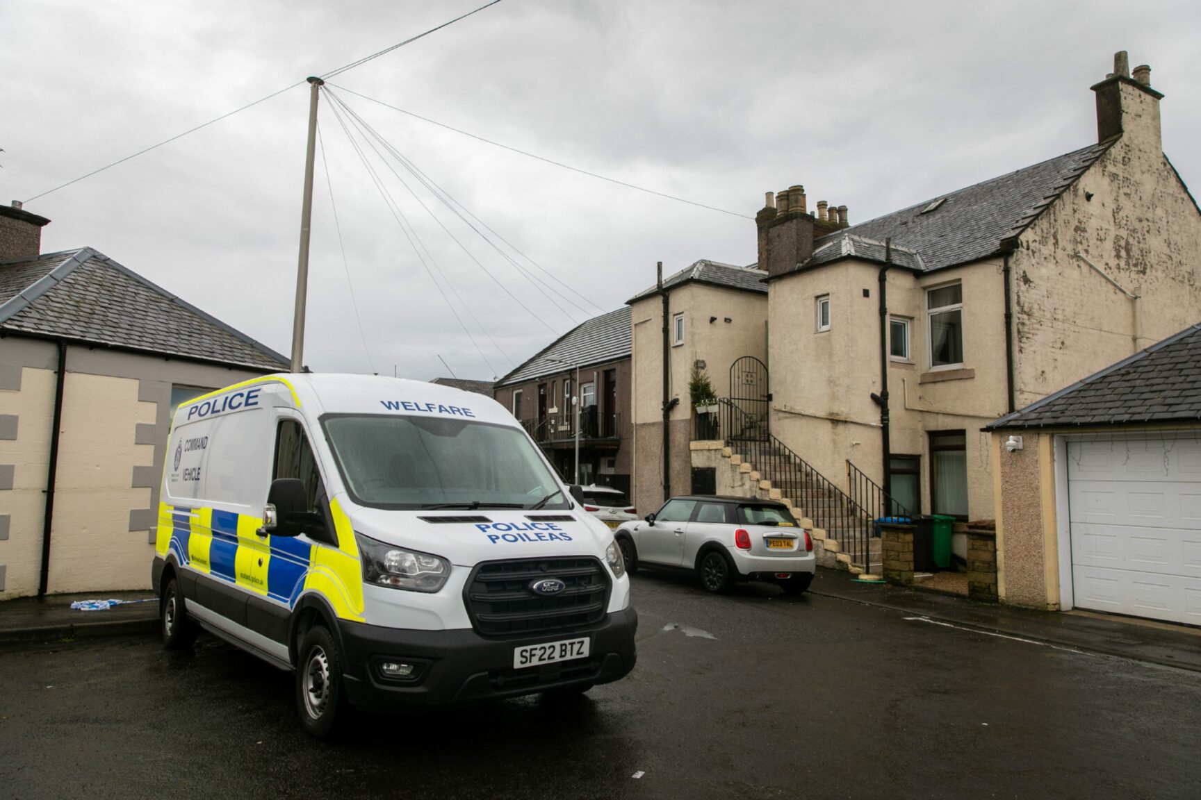 Fire investigators and forensics officers at scene of Methil death