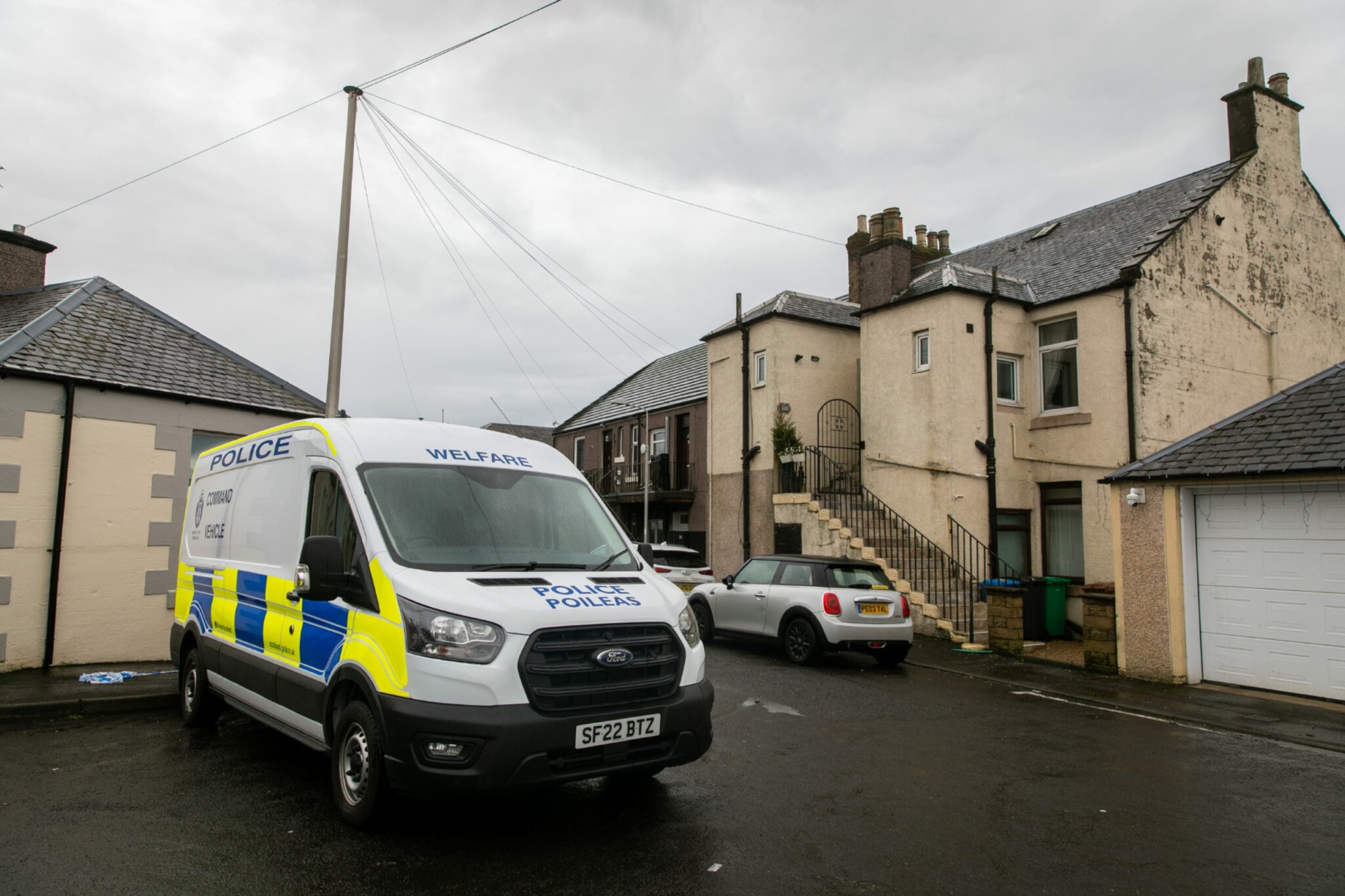 Fire investigators and forensics officers at scene of Methil death