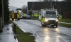 Emergency services respond to the crash on the A919 Station Road in Leuchars.