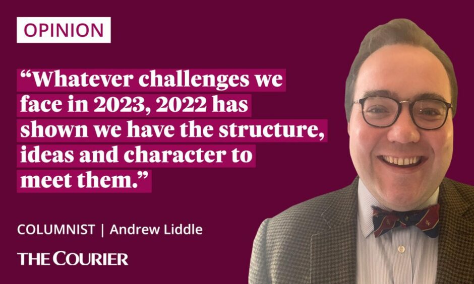 the writer Andrew Liddle next to a quote: "Whatever challenges we face in 2023, 2022 has shown we have the structure, ideas and character to meet them."