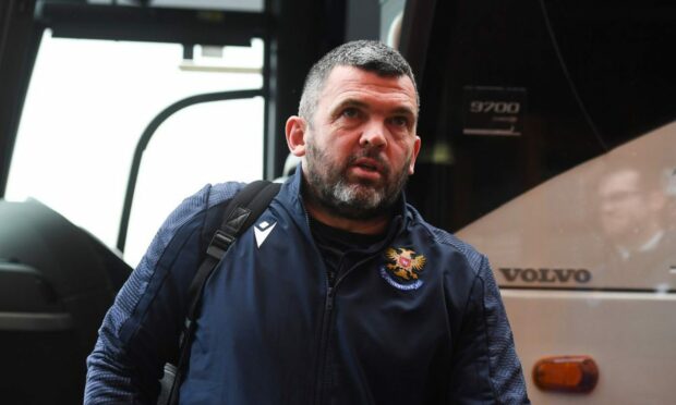 Callum Davidson heads from the St Johnstone team bus into Pittodrie ahead of Saturday's clash with Aberdeen. Image: SNS