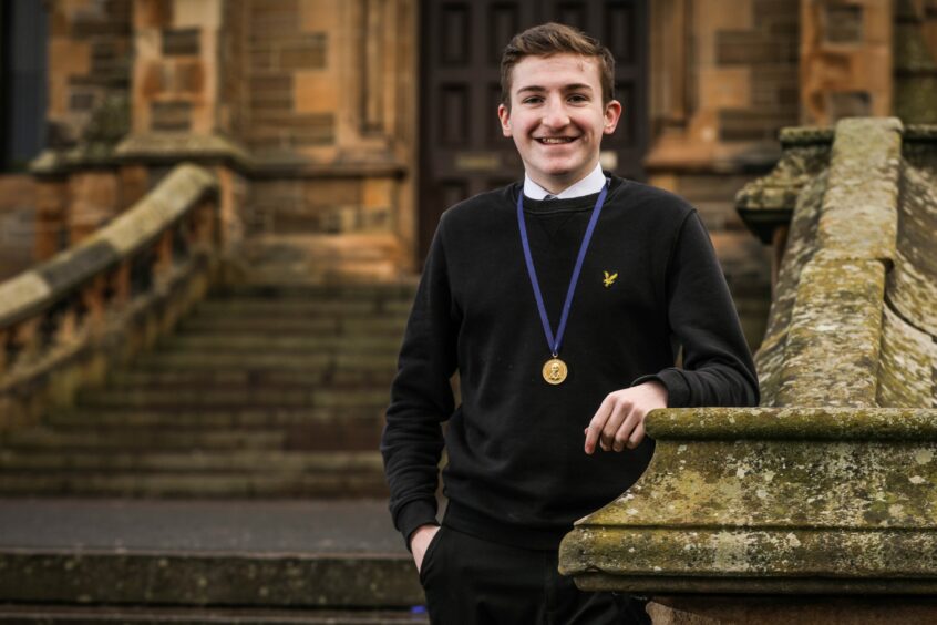 Morgan Academy pupil Archie Turnbull with his Gold Leng Medal