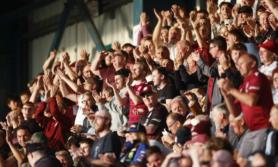 Arbroath fans cheering and clapping
