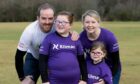 Caitlin Wilkie with her parents Liam and Ashley, and sister Niamh Image: Perthshire Picture Agency.
