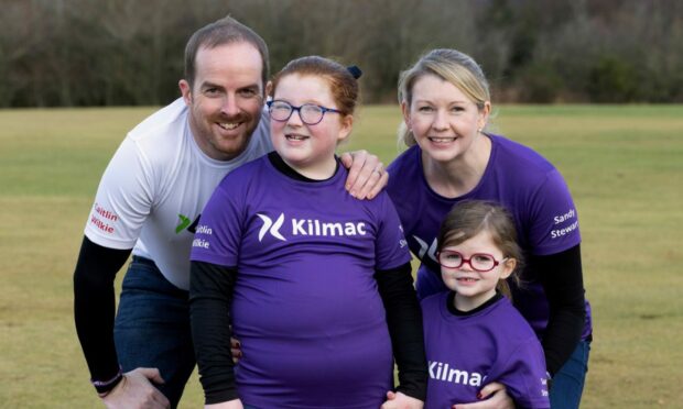 Caitlin Wilkie with her parents Liam and Ashley, and sister Niamh Image: Perthshire Picture Agency.