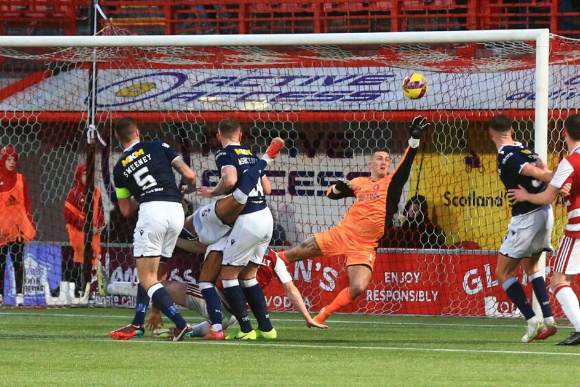 Ryan Fulton denies Dundee in the second half.
