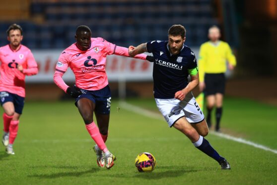 Dundee skipper Ryan Sweeney takes on Raith Rovers. Image: David Young/Shutterstock.