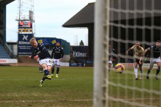 Lyall Cameron sees his penalty saved by Scott Fox. Image: David Young/Shutterstock.